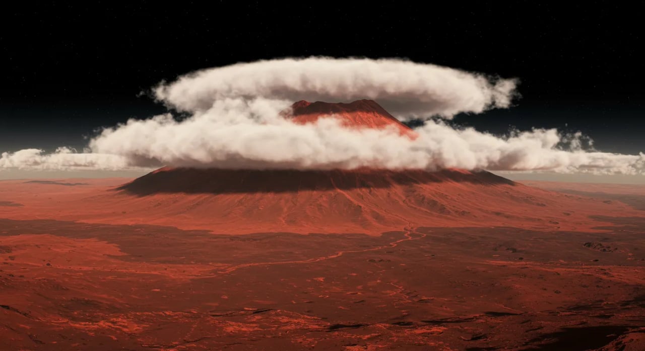 Sotto il Manto delle Nuvole Marziane: Dentro la Fotografia Sbalorditiva dell’Arsia Mons e i Misteri della Superficie Rossa Cover